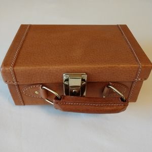 Brown mini suitcase